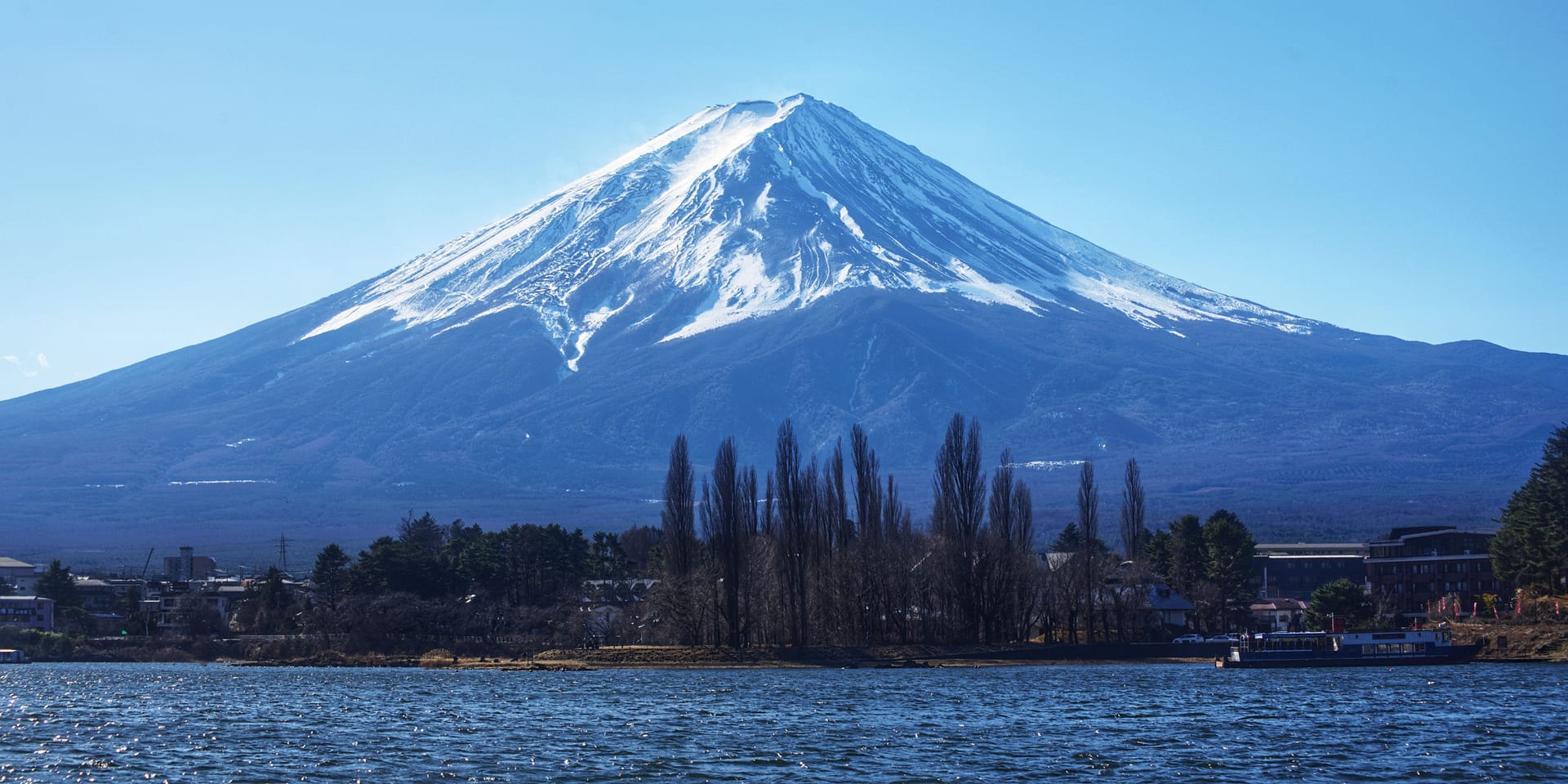 Mount Fuji perfect snow-capped volcanic cone reflection Japan