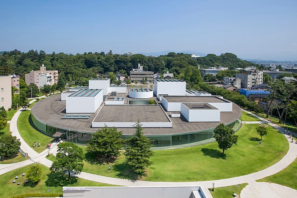 Circular glass exterior of the 21st Century Museum of Contemporary Art in Hirosaka, Kanazawa