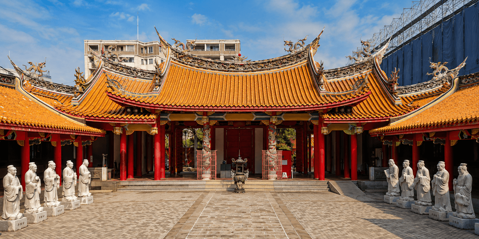 Courtyard lined with life-size stone statues of Confucius's disciples at the Nagasaki Confucius Shrine in Ouramachi, Nagasaki