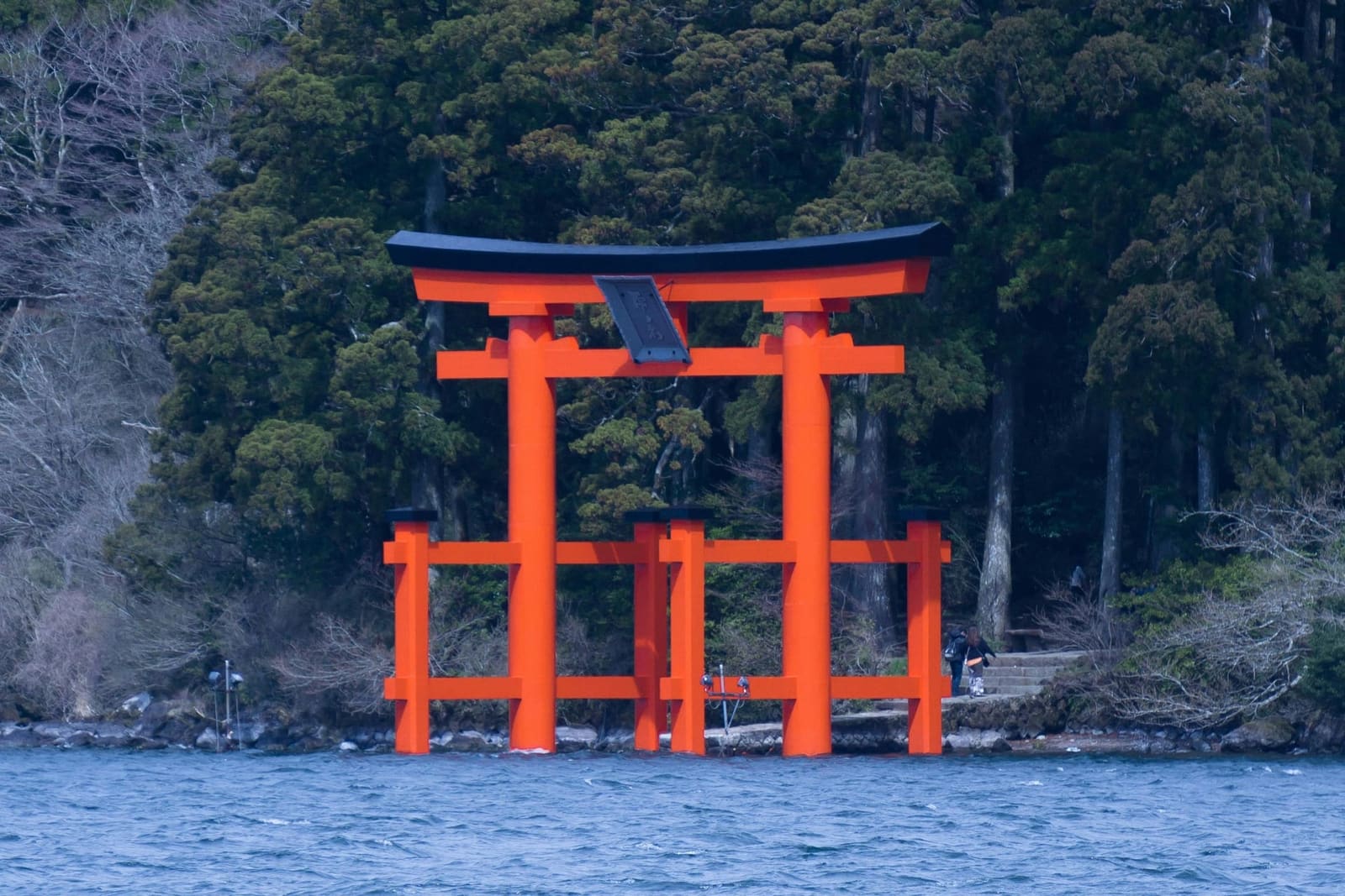 Lake Ashi Ashinoko calm waters with Mt Fuji in background Hakone Japan
