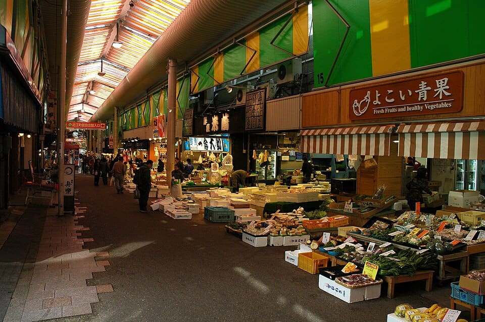 Fresh crab and seafood displayed at a stall inside Omicho Market in Kanazawa