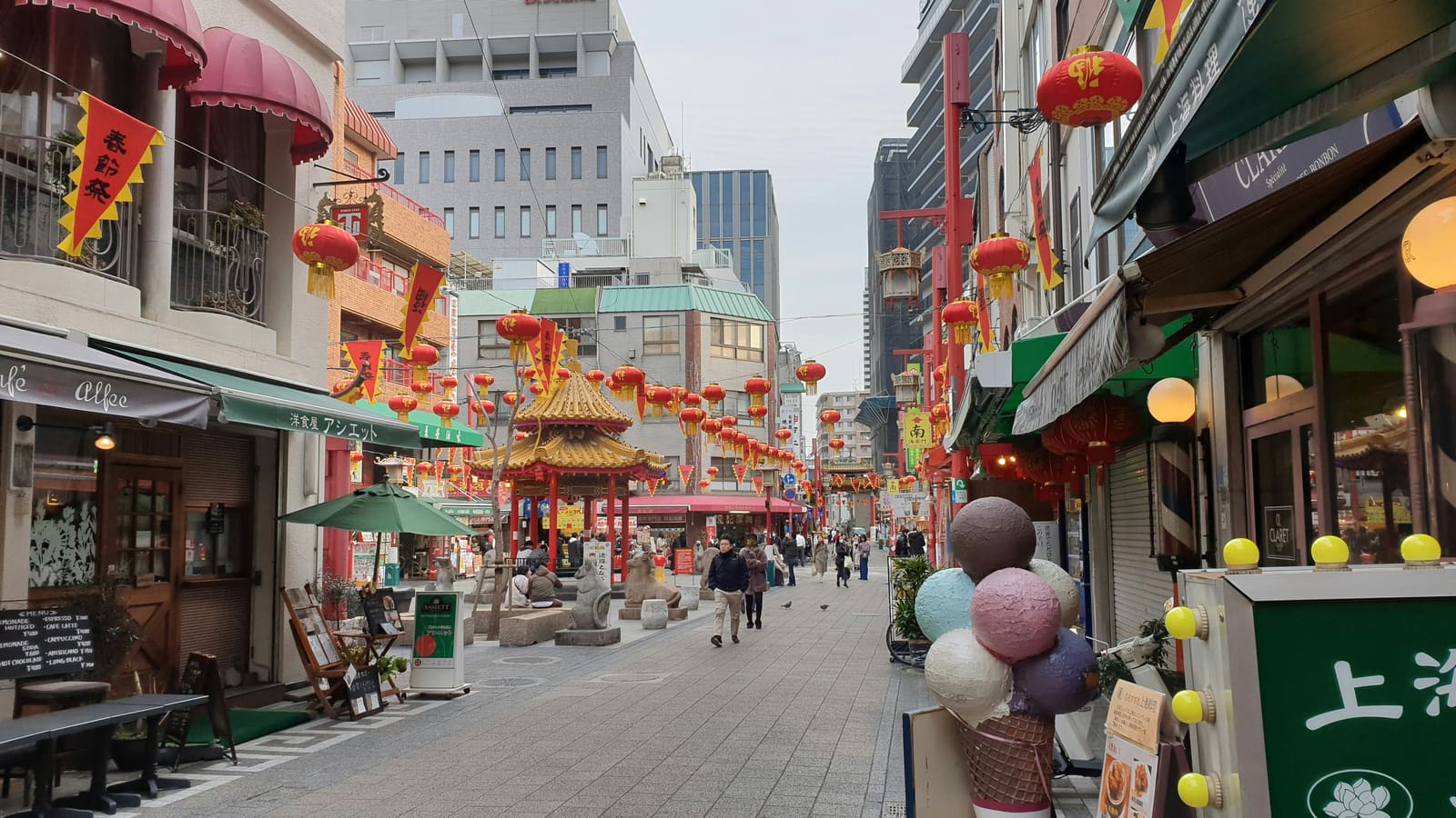 Food stalls and red lanterns along one of Nankinmachi's two main streets in central Kobe.
