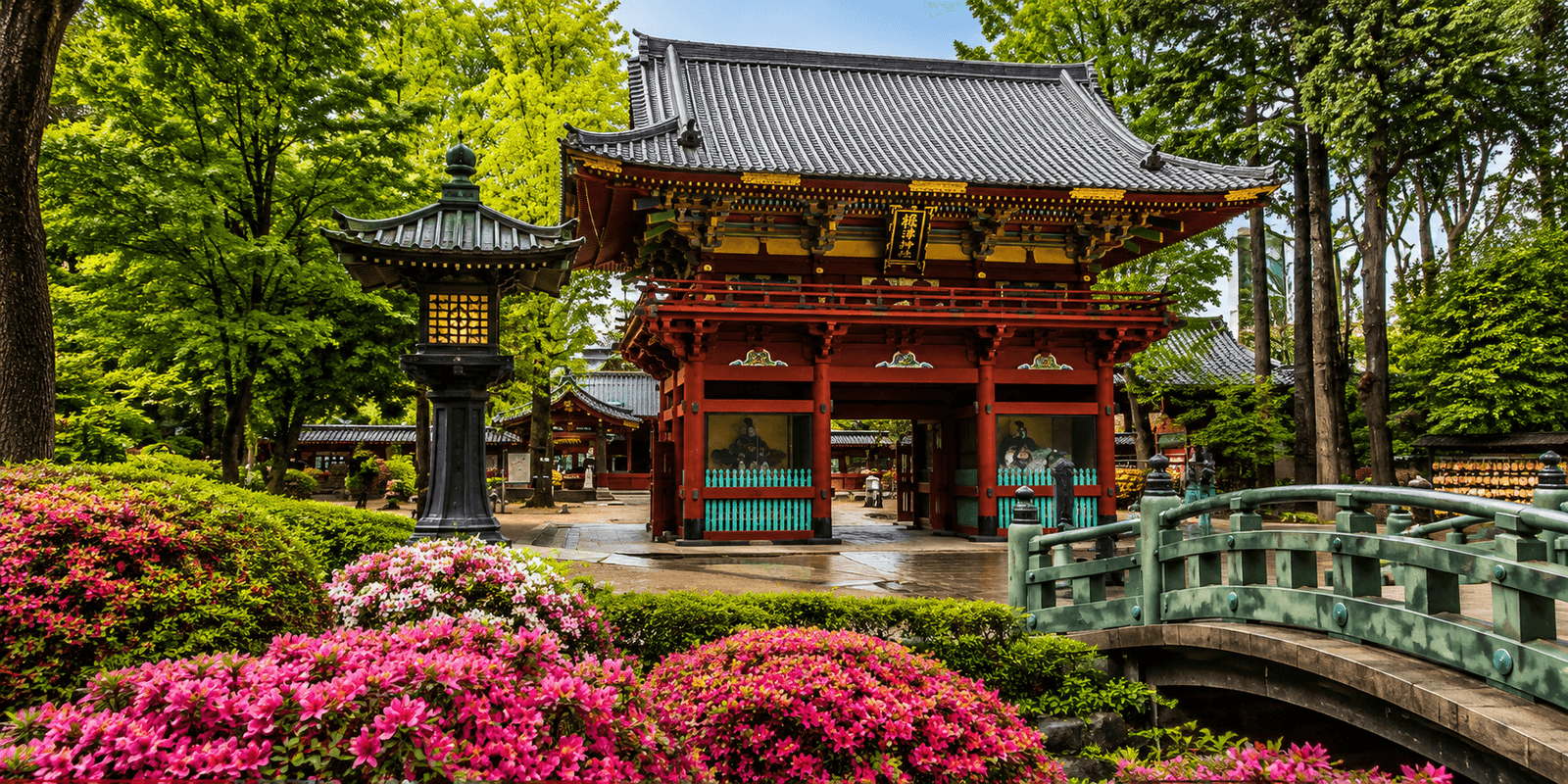 Vermillion torii gate tunnel winding uphill to Otome Inari Shrine at Nezu Shrine, Bunkyo, Tokyo, Japan