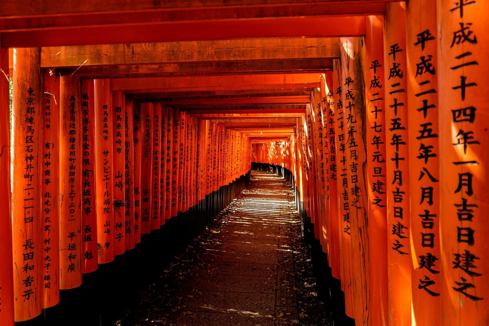 Rows of red torii gates at Fushimi Inari Shrine, Kyoto