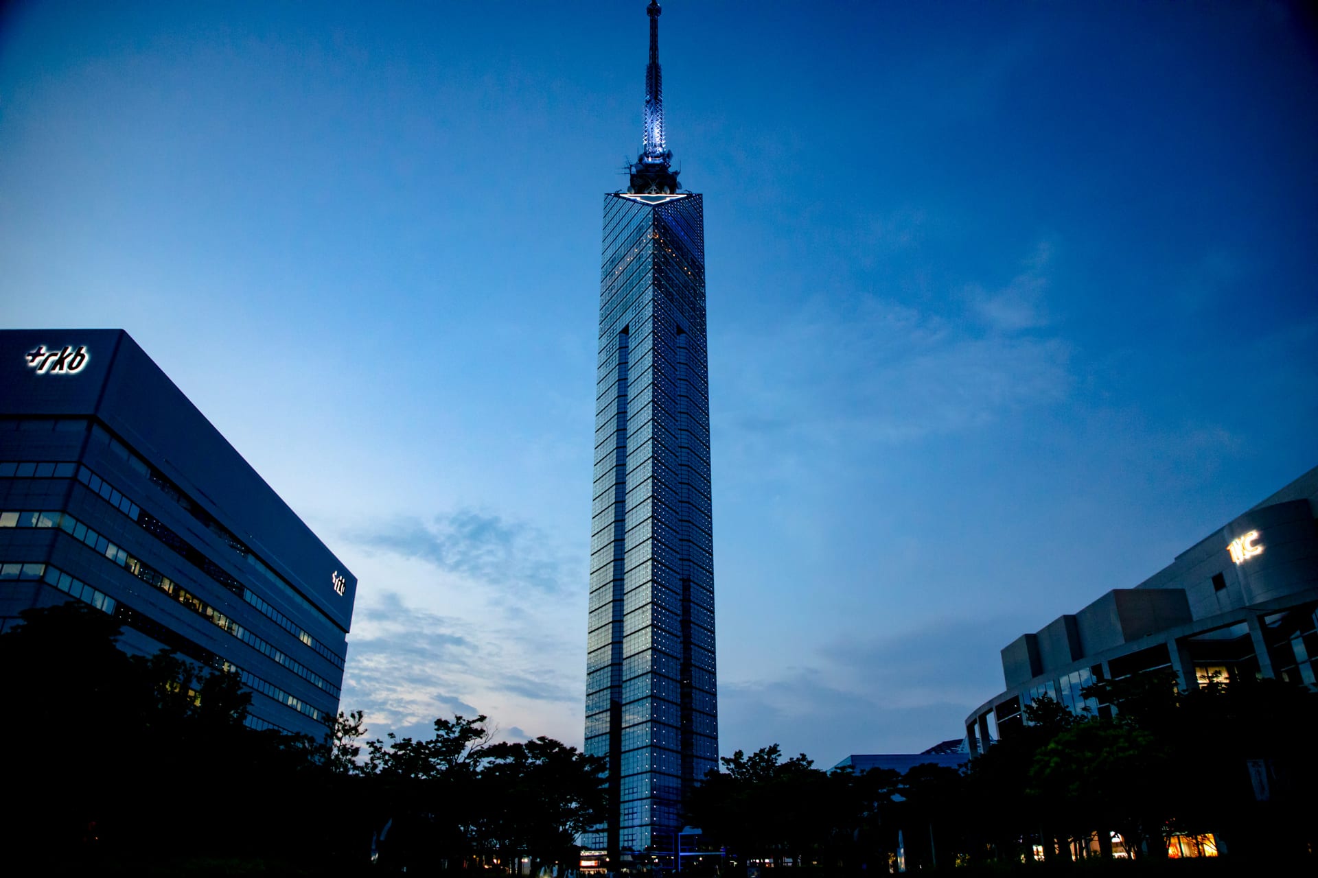 View of Fukuoka Tower and the Momochi waterfront at sunset