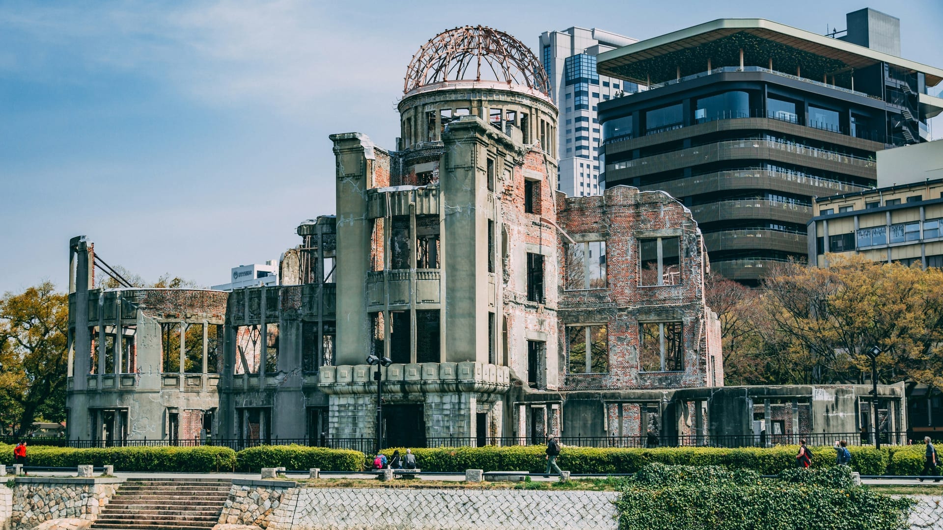 Hiroshima Peace Memorial Park with the A-Bomb Dome ruins and surrounding city viewed on a clear blue sky day, Japan