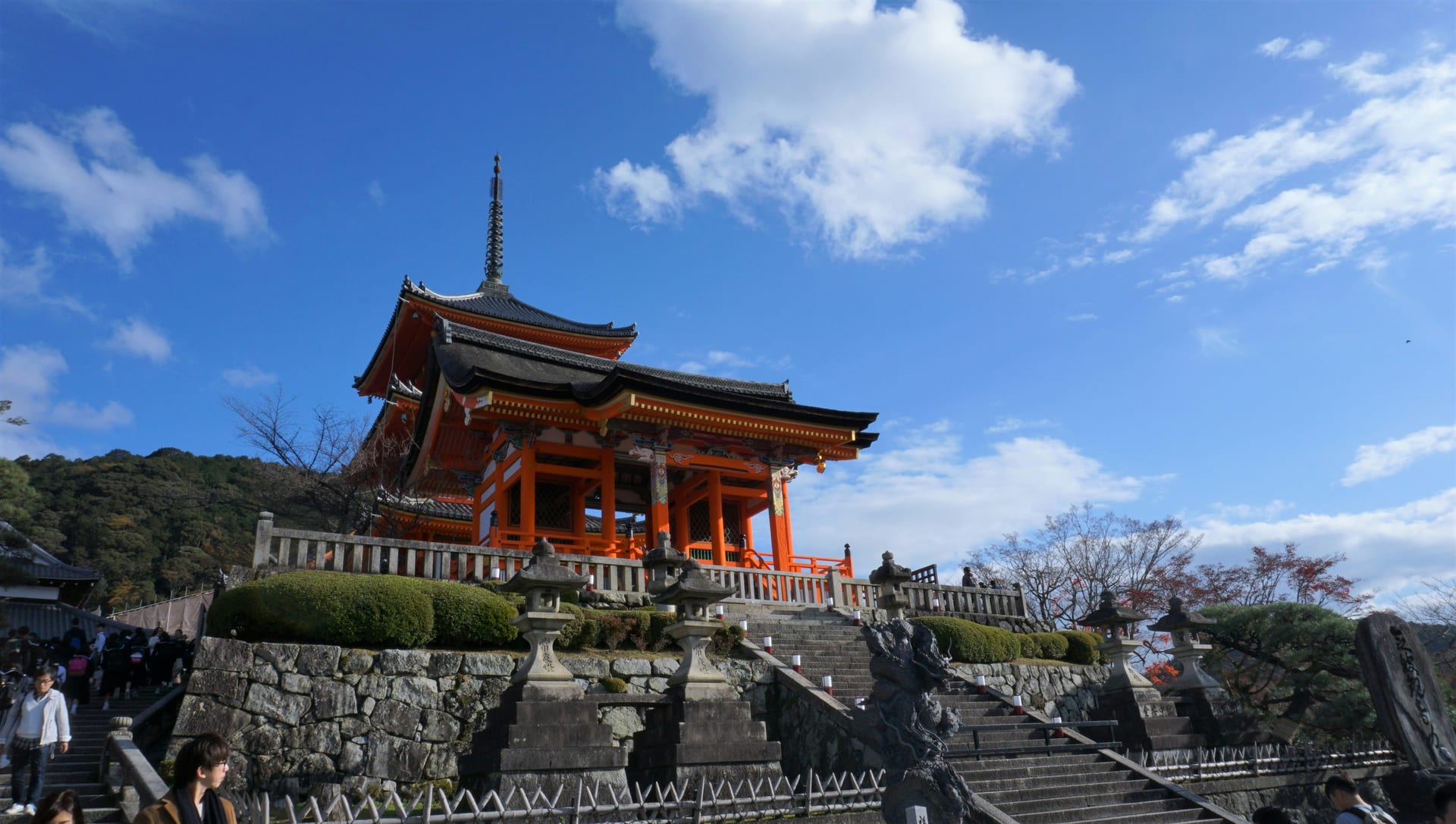 The famous wooden stage of Kiyomizu-dera Temple extending over the forested hillside with panoramic views of Kyoto