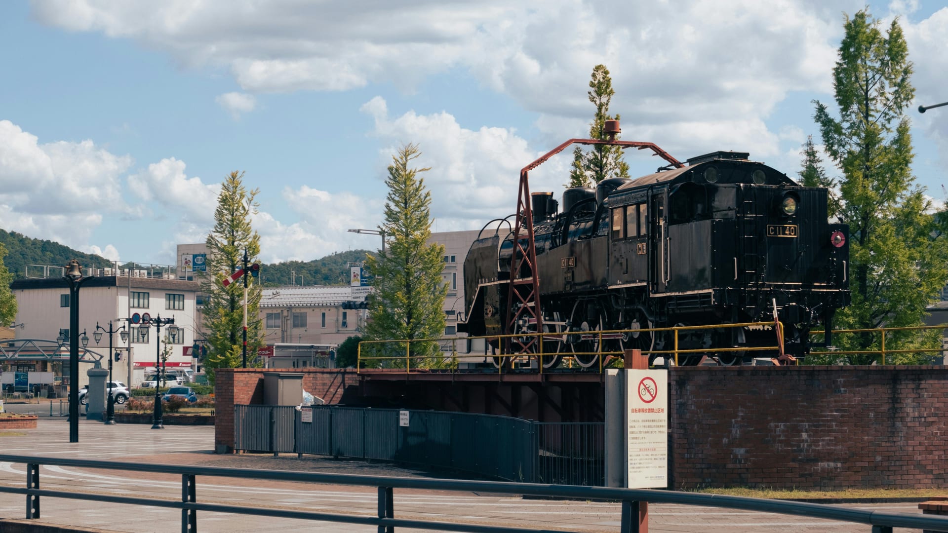 The 1914 Roundhouse at Kyoto Railway Museum with steam locomotive on the functioning turntable