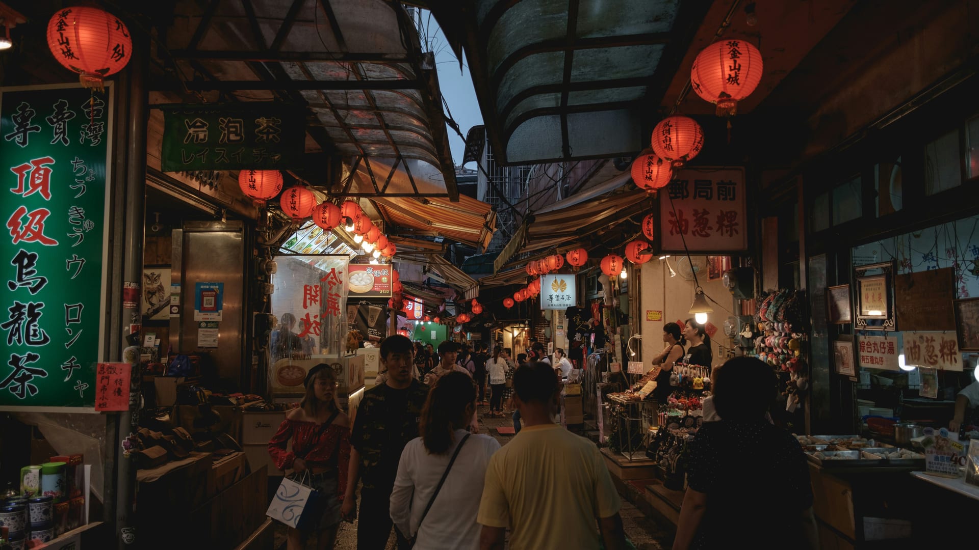 Fresh seafood and street food snacks on display at Nishiki Market