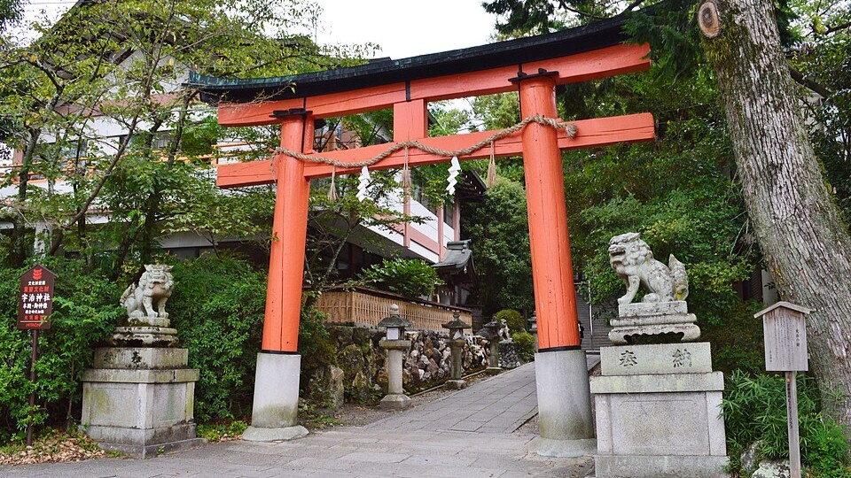 Traditional matcha tea shops lining the historic street approaching Byodo-in in Uji
