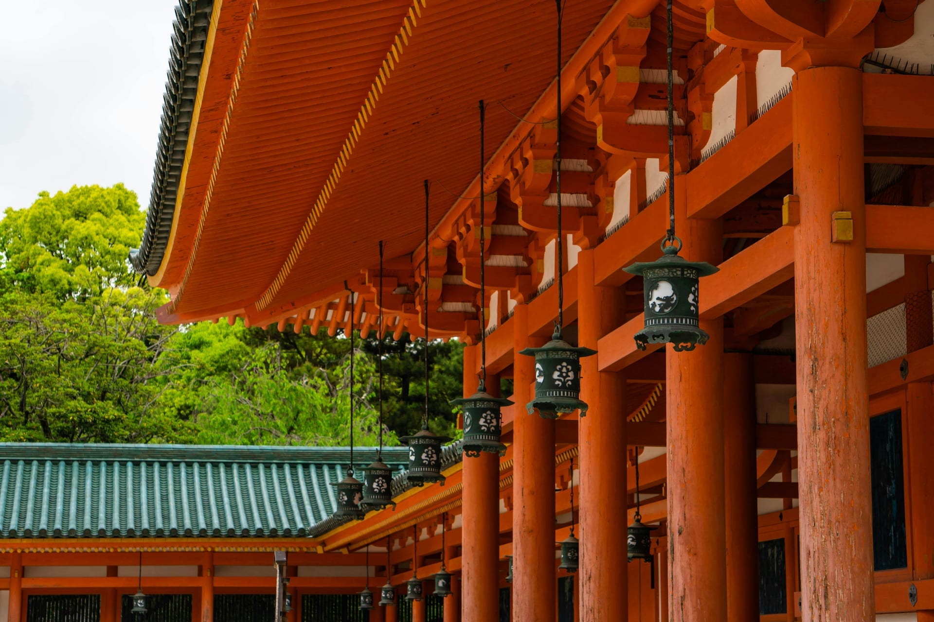 Kasuga Taisha hanging bronze lanterns vermilion corridor Nara Japan
