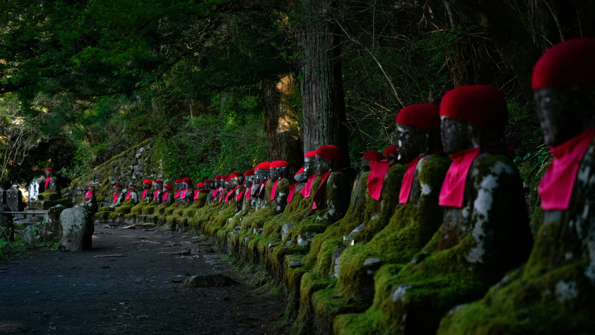 Kanmangafuchi Abyss row of stone Jizo statues along the Daiya River in Nikko