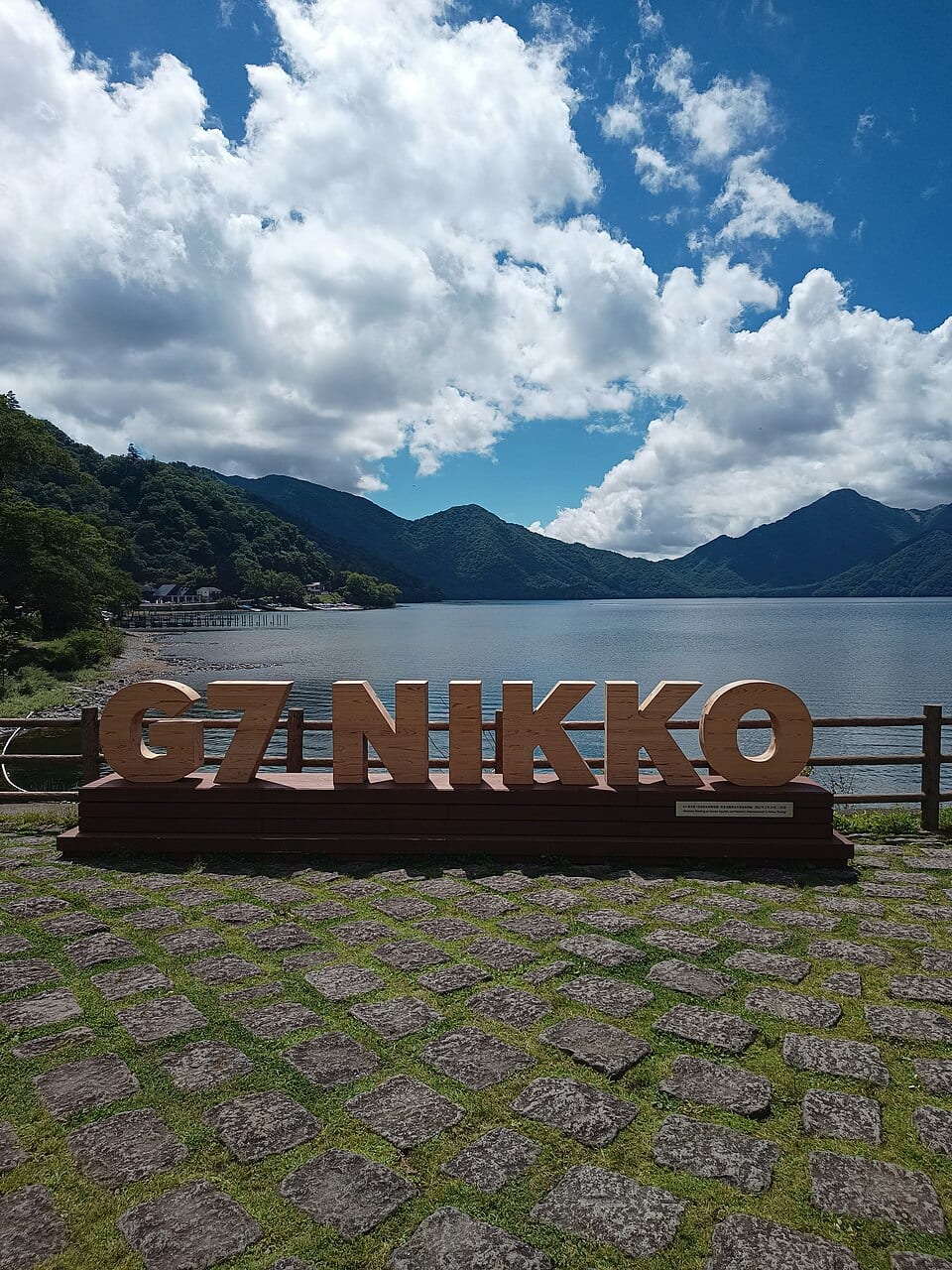 Lake Chuzenji with Mount Nantai rising above the shoreline in Nikko