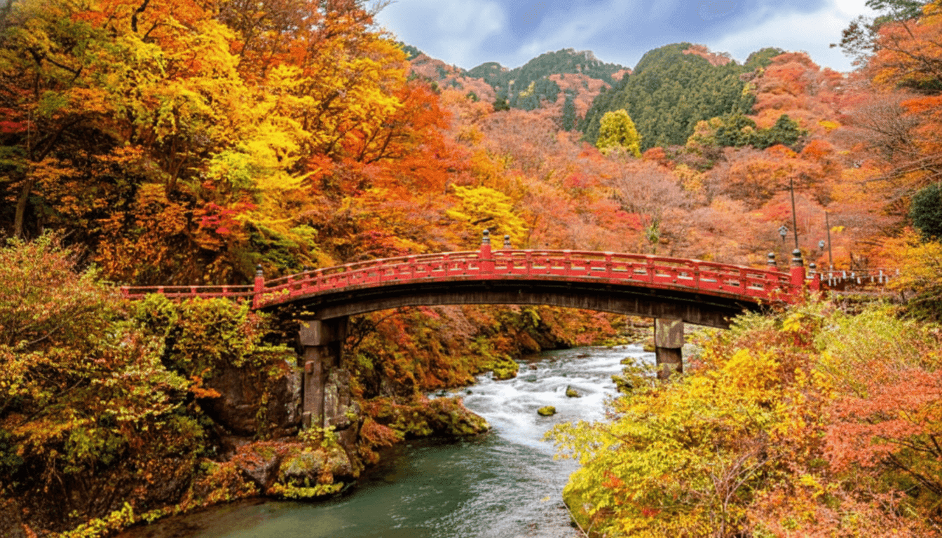 View of the vermilion Shinkyo Bridge spanning the Daiya River in Nikko