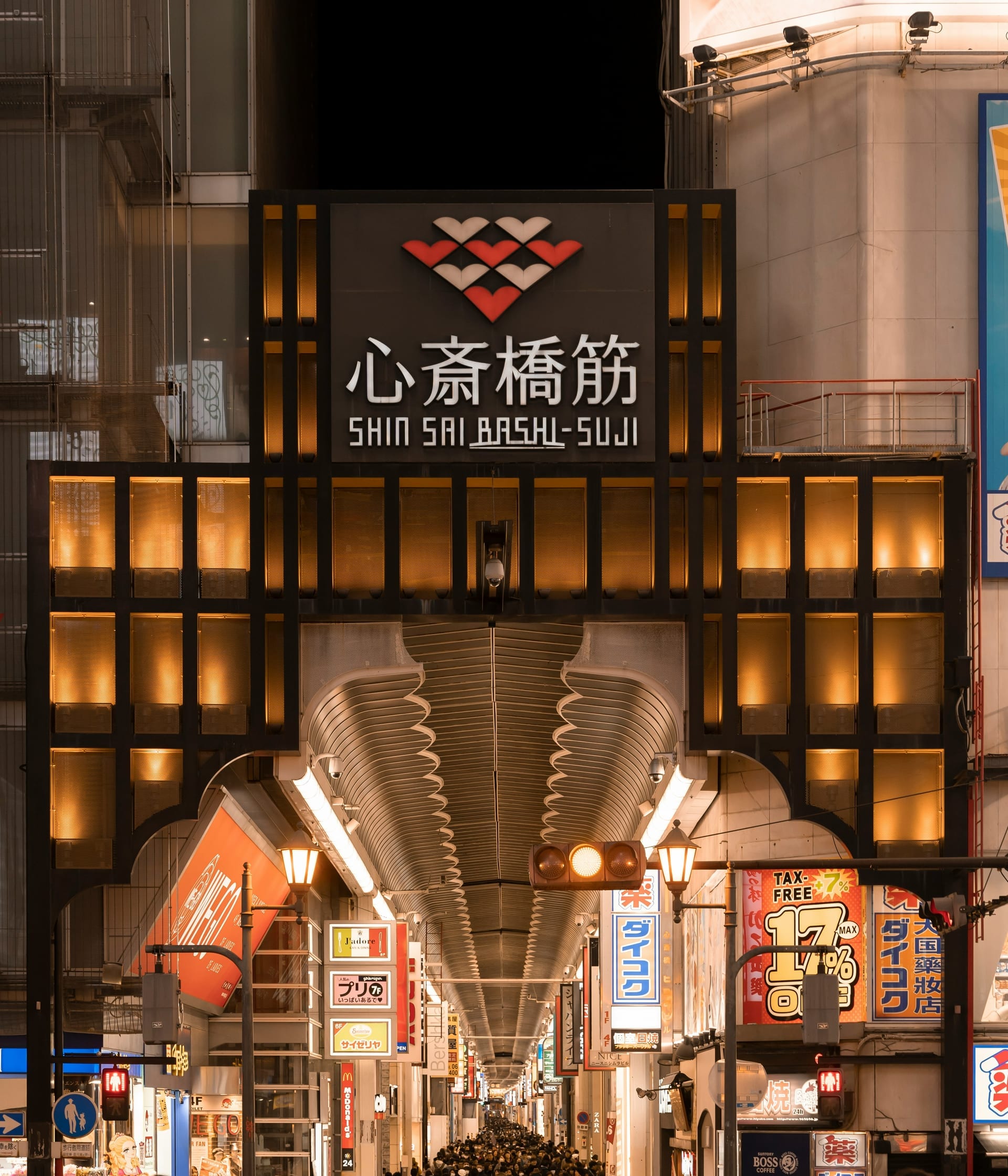 Fashion boutiques and international brands lining Shinsaibashi Shopping Street in central Osaka, Japan