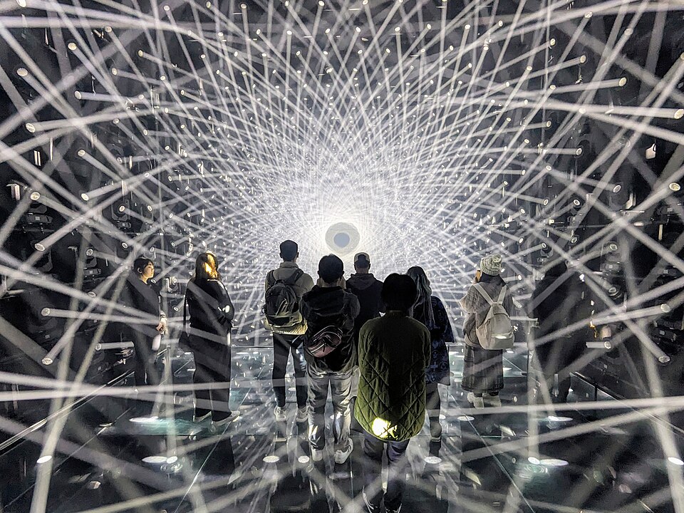 Immersive glowing light installations inside teamLab digital art museum