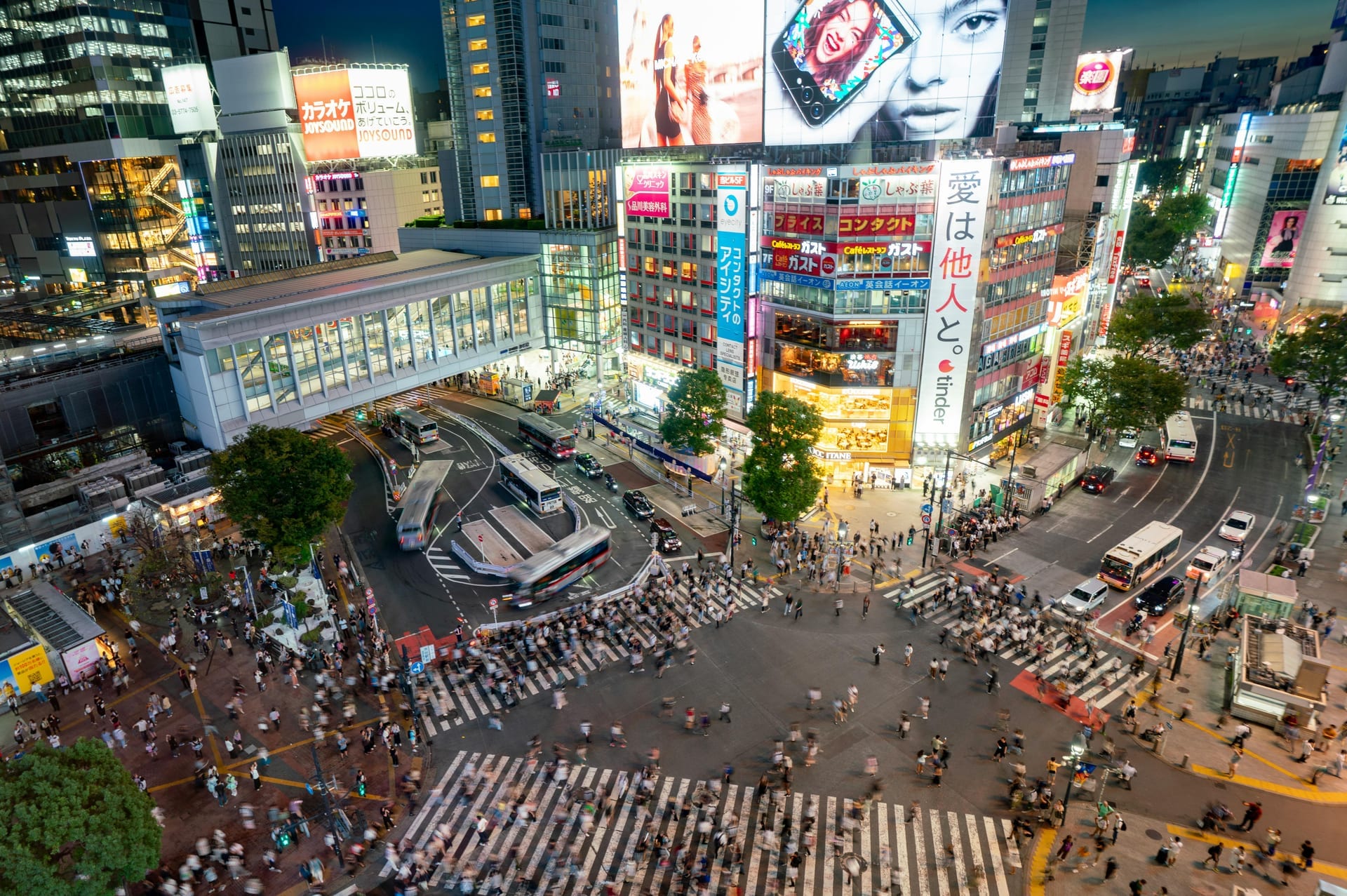 Shibuya Crossing - world's busiest pedestrian scramble crossing at night, Tokyo, Japan